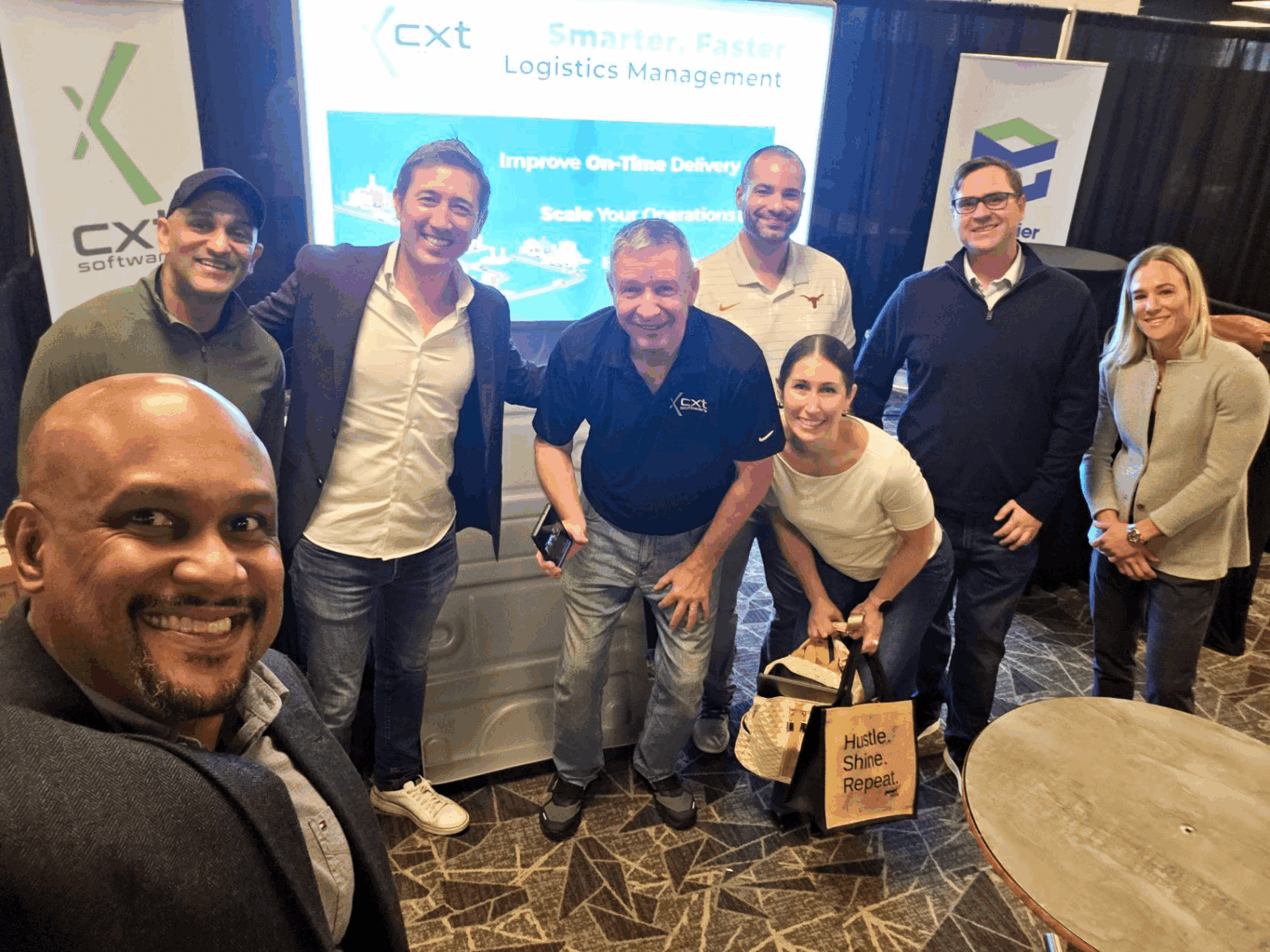 The CXT Software team at the Final Mile Forum booth